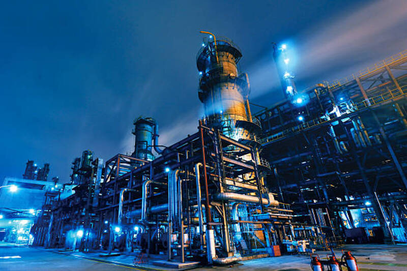 Oil Refinery, Chemical & Petrochemical plant abstract at night. manufacturing